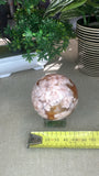 Red flower agate sphere