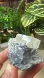 Raw fluorite cube on matrix