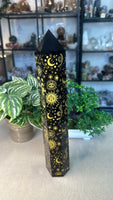 Obsidian Tower with gold etched Carvings