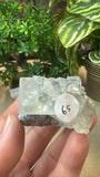 Raw fluorite cube on matrix