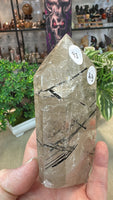 Black tourmaline in Quartz tower in custom stand