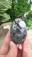 Black tourmaline in Quartz Palm stones