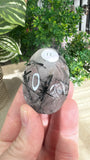 Black tourmaline in Quartz Palm stones