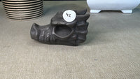 Silver obsidian dragon head