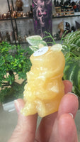 Orange calcite Winnie the Pooh
