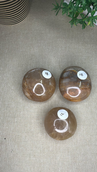 Peach moonstone palm stones