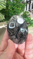 Black tourmaline in Quartz Palm stones