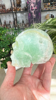 Pistachio calcite skull