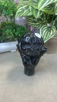Obsidian Hand with pumpkin