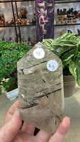 Black tourmaline in Quartz tower in custom stand