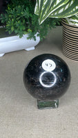 Firework stone with garnet sphere