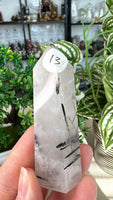 Black tourmaline in Quartz points