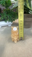 Orange calcite Winnie the Pooh