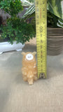Orange calcite Winnie the Pooh