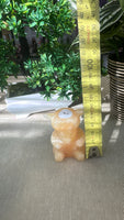 Orange calcite tigger