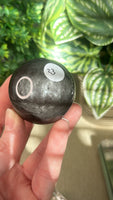 Silver obsidian spheres