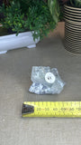 Raw fluorite cube on matrix