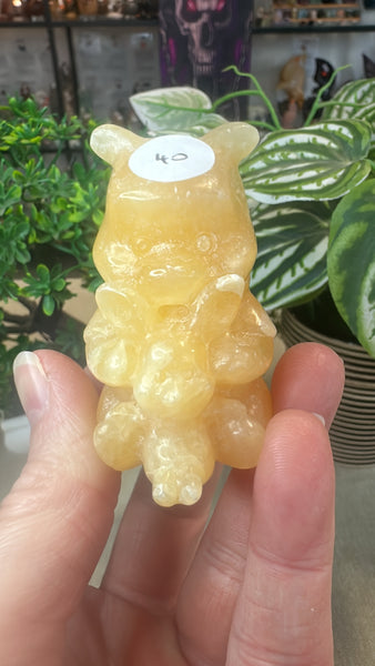 Orange calcite Winnie the Pooh
