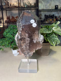 Raw Smokey Quartz on stand