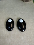 Obsidian palm stones