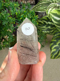 Black tourmaline in Quartz points