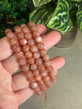 Peach moonstone and sunstone bracelets 7mm