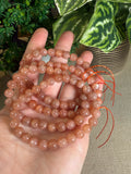 Peach moonstone and sunstone bracelets 7mm