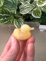 Orange calcite Ducks