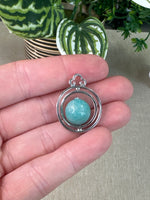 Spinning Crystal Pendants