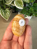 Orange Calcite Palm Stones