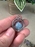 Spinning Crystal Pendants